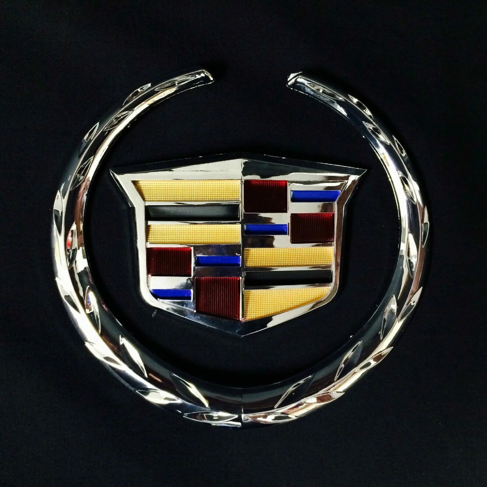 Кадиллак марка. Значок Cadillac Эскалейд. Cadillac Escalade марка. Значок Кадиллака и Джилли.