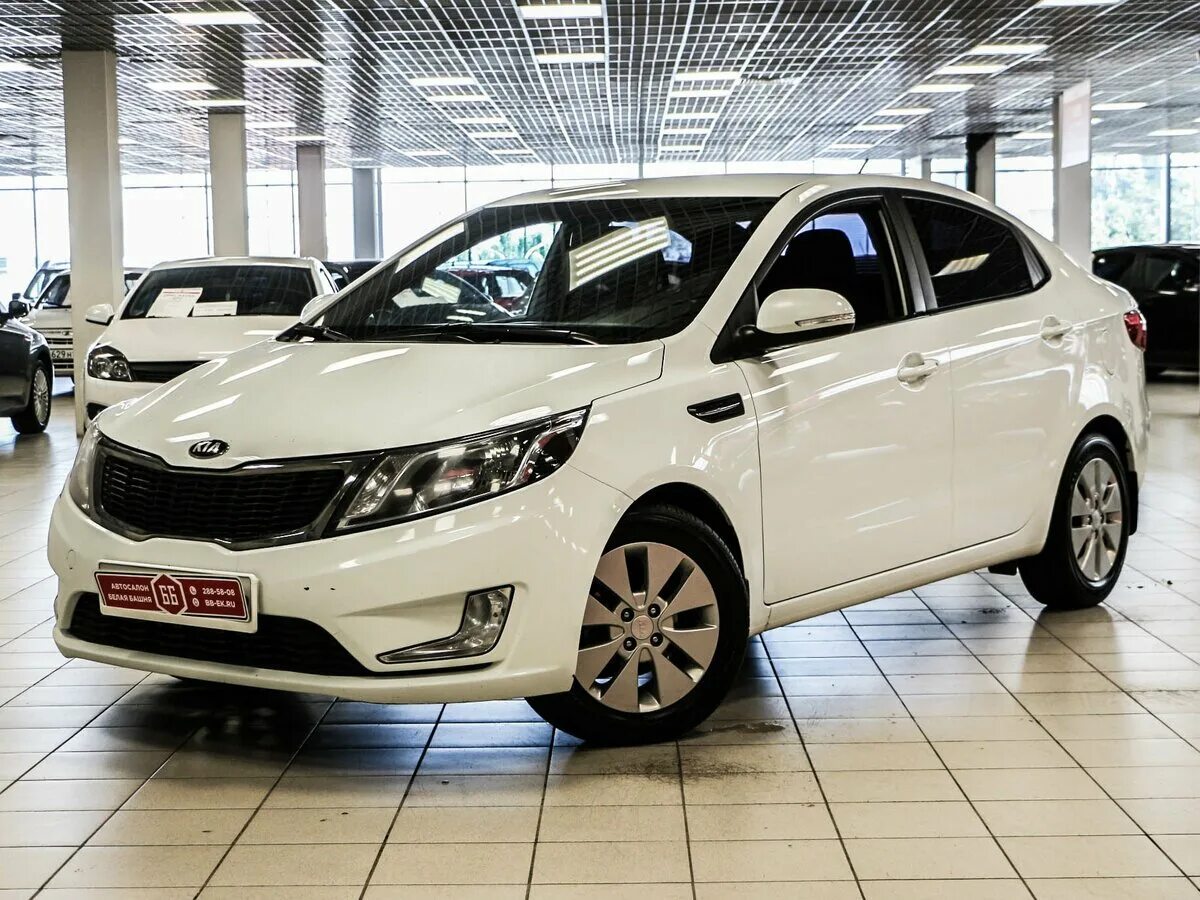 Озон киа рио 3. Kia Rio 2014. Kia Rio 201. Kia Rio, 2014 г.в. Kia Rio 2014 седан.