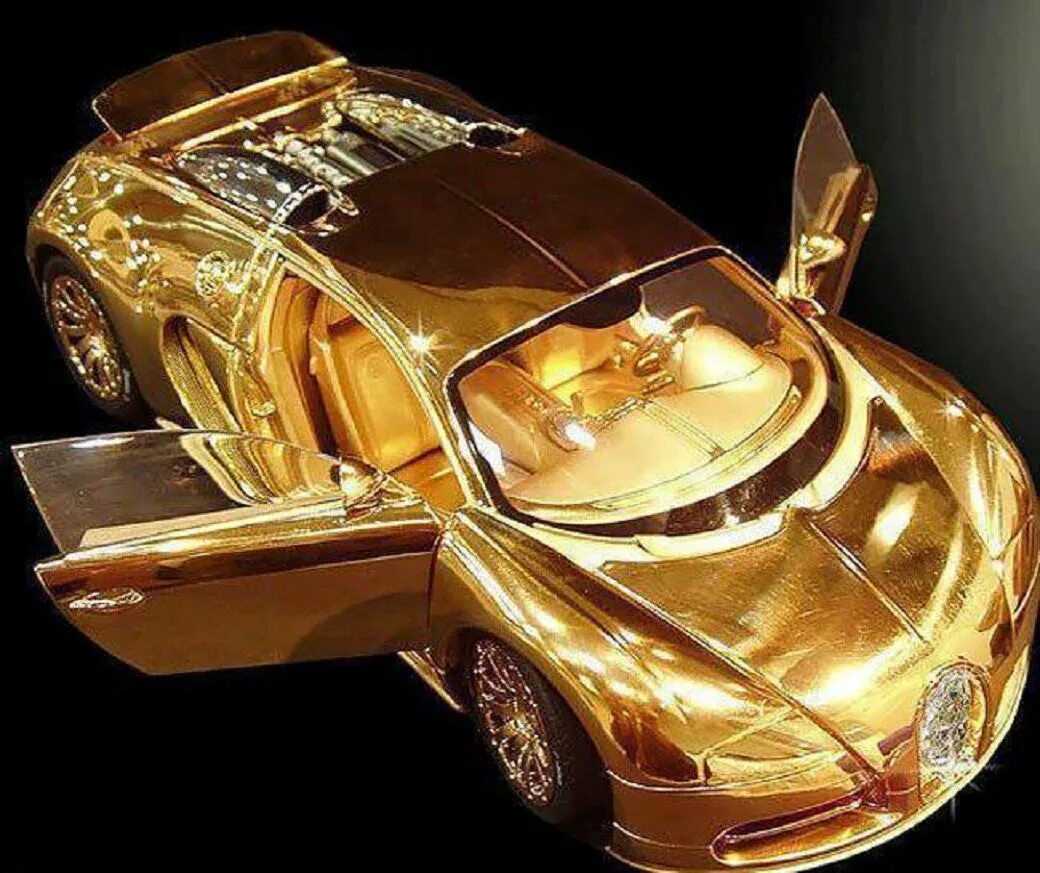 Expensive gold. Бугатти Вейрон золотой. Bugatti Veyron Золотая. Бугатти Вейрон из золота.