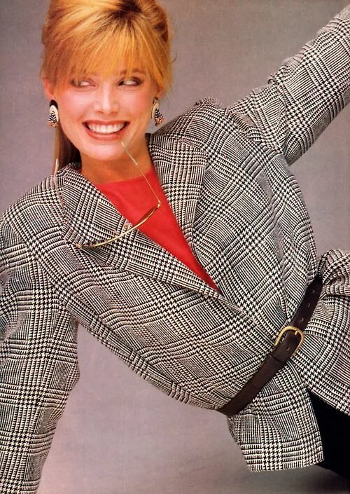Мода женская 1980 годов Throwback outfits, smiling brunette woman in green 80s suit with white shirt, ov