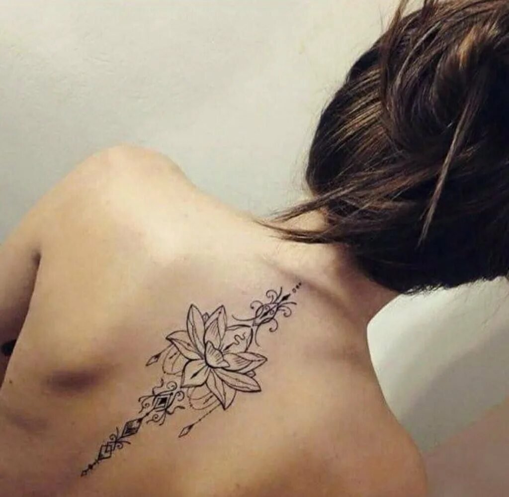Тату лотос на пояснице для девушек. Тату на спине женские лотос. Что значат татуировки у девушек. Что значат татуировки у девушек. Что значат татуировки у девушек.