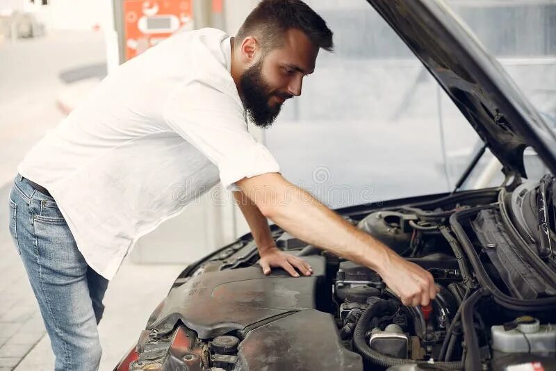 He repair his car