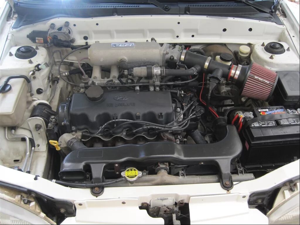 Какой двигатель на акценте. Хендай акцент 2002 года двигатель. Двигатель Хендай акцент ТАГАЗ. Hyundai Accent 1.3 мотор. Мотор Хендай акцент ТАГАЗ.