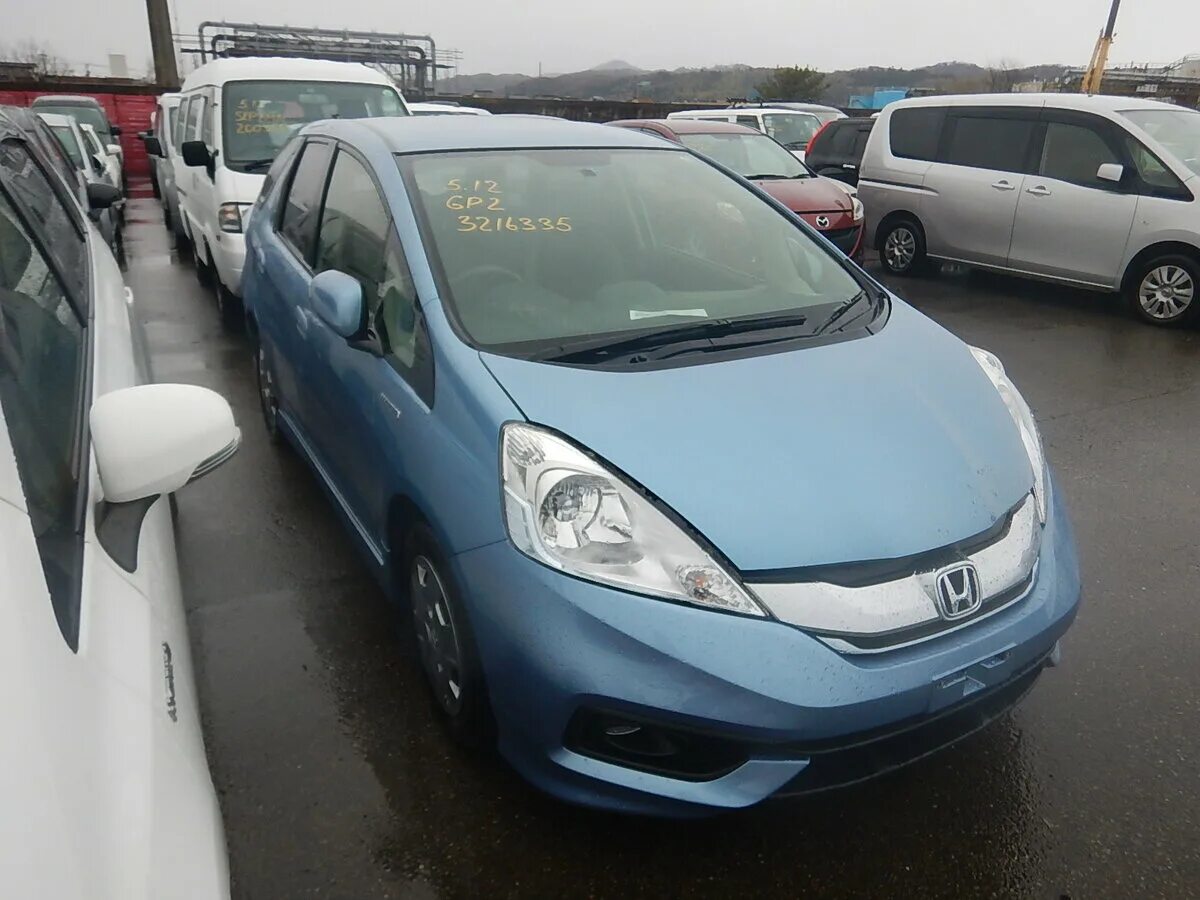 Honda Fit Shuttle Hybrid 2015. Хонда фит Shuttle. Хонда фит шаттл гибрид. Хонда фит шаттл 2015 Hybrid.