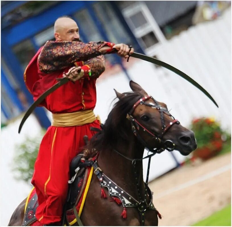 Ukrainian cossack. Запорожский Козак с саблей. Запорожский казак характерник. Запорожский Козак на коне. Казак с шашкой.