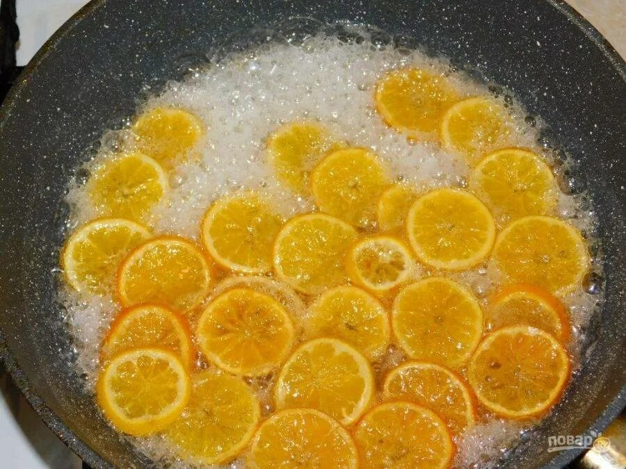 Цукаты из мандаринов. Засахаренные мандарины. засахаренные дольки мандарина. цукаты из мандариновых долек.