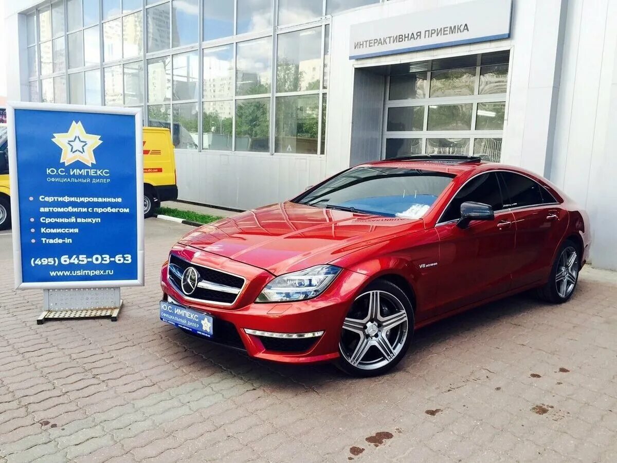 Купить мерседес в москве у официального дилера. Mercedes CLS 63 AMG 2023. W218 Mercedes Red. CLS компрессор Мерседес красный. Mercedes 63 AMG красный в Москве.