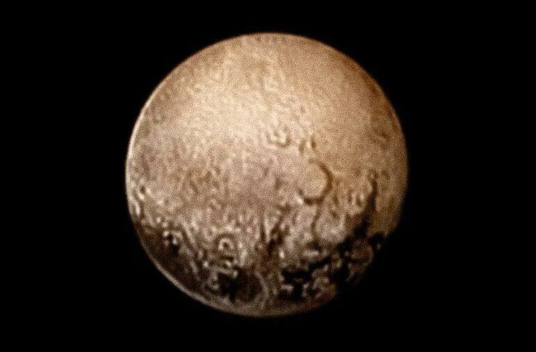 Плутон в первом. Фото Плутона 1996. Плутон последние фото. Первое фото Плутона. Фотографии Плутона в высоком разрешении.