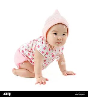 Full body Six months old East Asian baby girl crawling on white backgroun.....