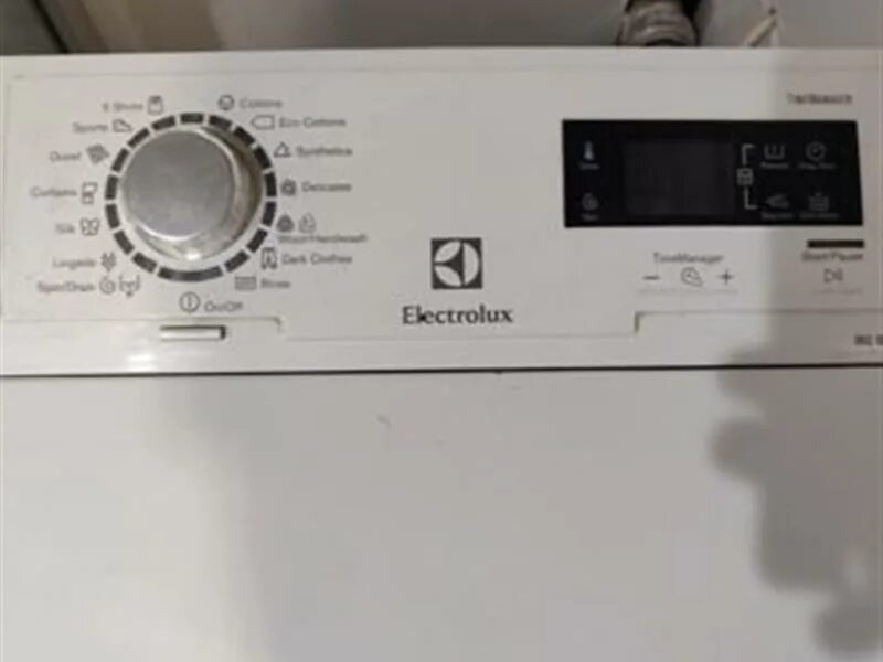 Вертикальная машинка electrolux