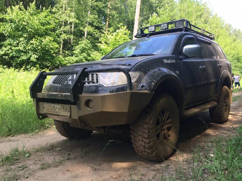 Расширители арок на Митсубиси Паджеро спорт 2. Расширители арок на Митсубиси Паджеро 2. Расширители Pajero Sport 1. Mitsubishi Pajero/ Sport 1999 широкие расширители. Расширители паджеро 2