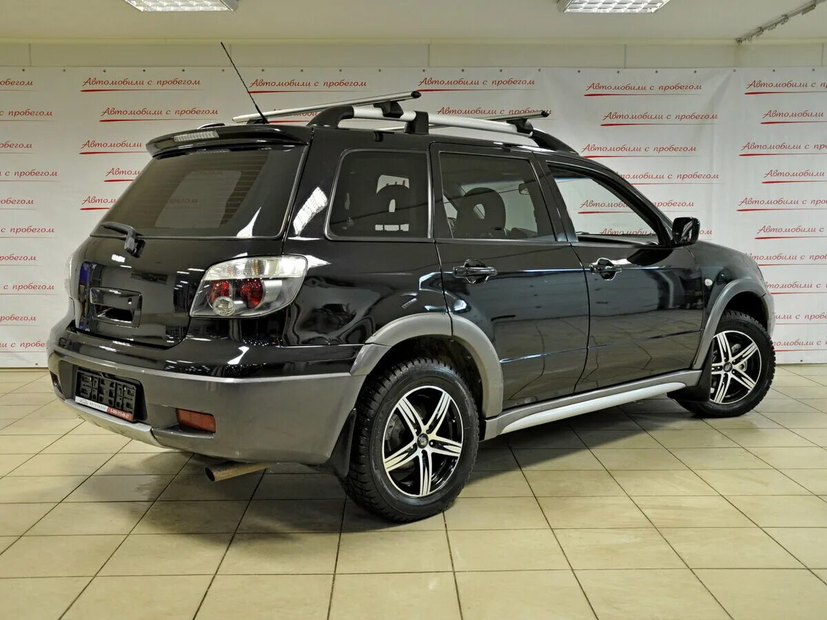 Mitsubishi outlander первое поколение. Mitsubishi Outlander 2005. Mitsubishi Outlander 1 поколение Tuning. Mitsubishi Outlander 1 черный. Митсубиси Аутлендер 1 поколения черный.