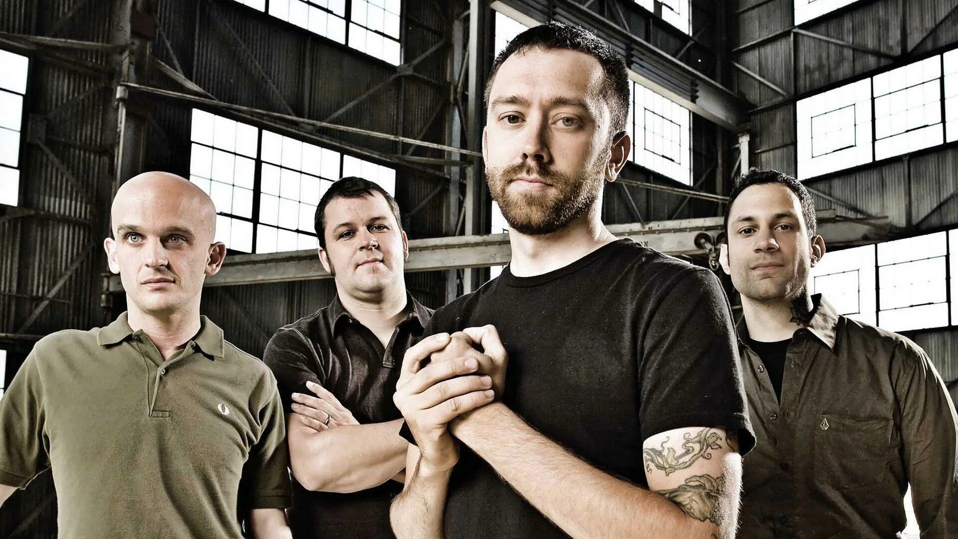 Rise against. Группа rise against. rise against вокалист. солист группы rise against. rise against 2025.
