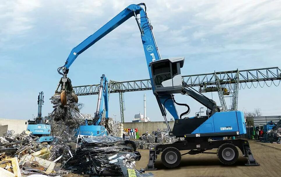 Перегружатели fuchs. Terex fuchs mhl 350. фукс погрузчик перегружатель. колесный перегружатель фукс. погрузчик металлолома фукс.