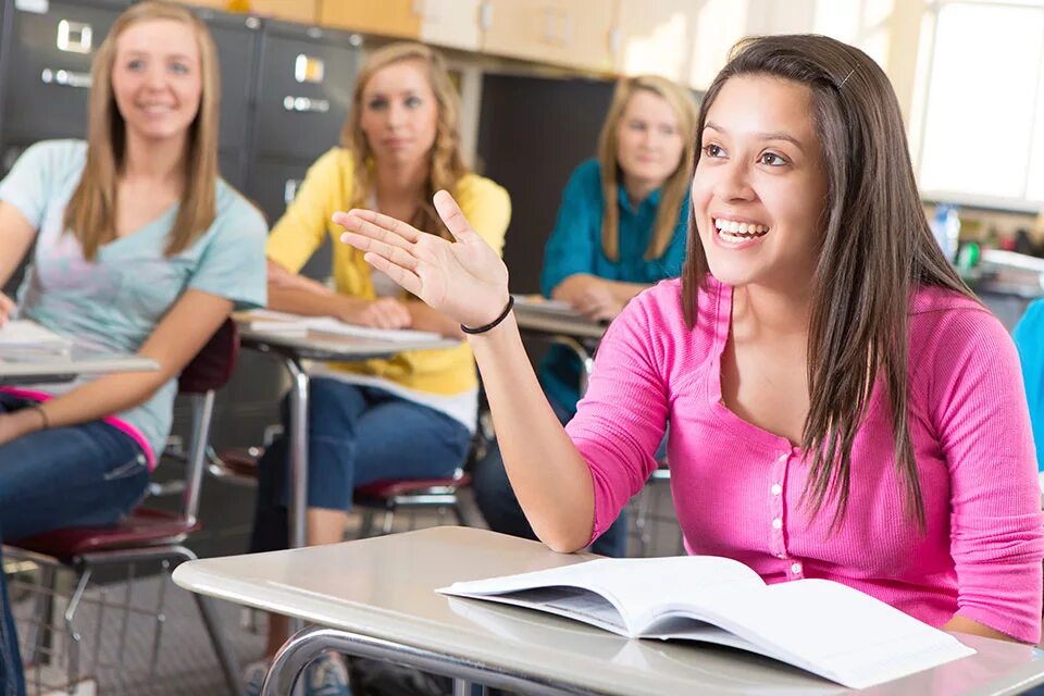 Explain something. Woman explains. isi - dublin language course. girl explaining business.