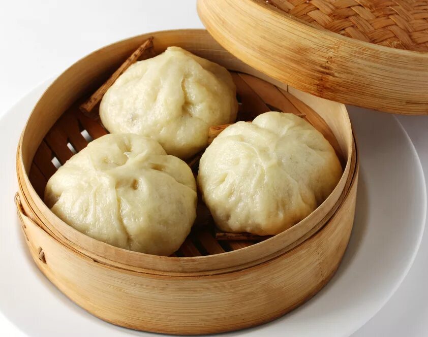 сяо баоцзы. сяо баоцзы. паровые вонтоны. китайские пельмени дамплинги. китайские цзяоцзы.