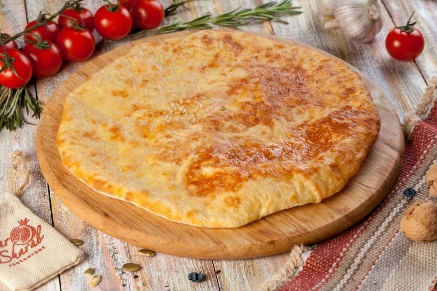 Осетинские пироги рецепт с сыром и картофелем. Осетинский пирог уалибах. осетинский сырный пирог. фыдчин осетинский. ногбон осетинские.