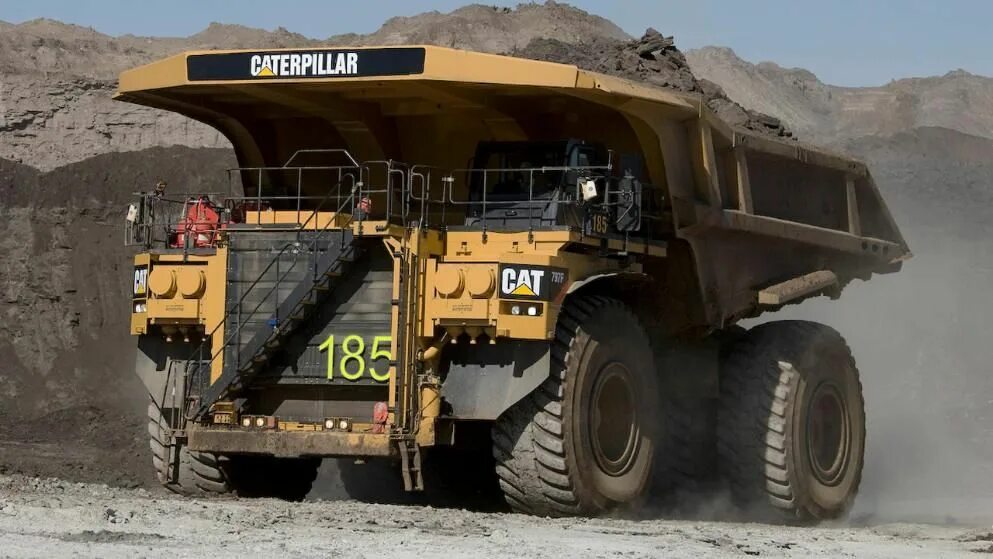Катерпиллер 772. Катерпиллер 797. Cat карьерный. Самосвал caterpillar 797f. Катерпиллер карьерный самосвал 797f.