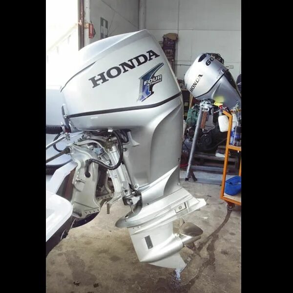 Honda bf60 трим. Мотор honda 60. Лодочный мотор хонда 60. Мотор хонда бф 60. Лодочный мотор хонда 60.