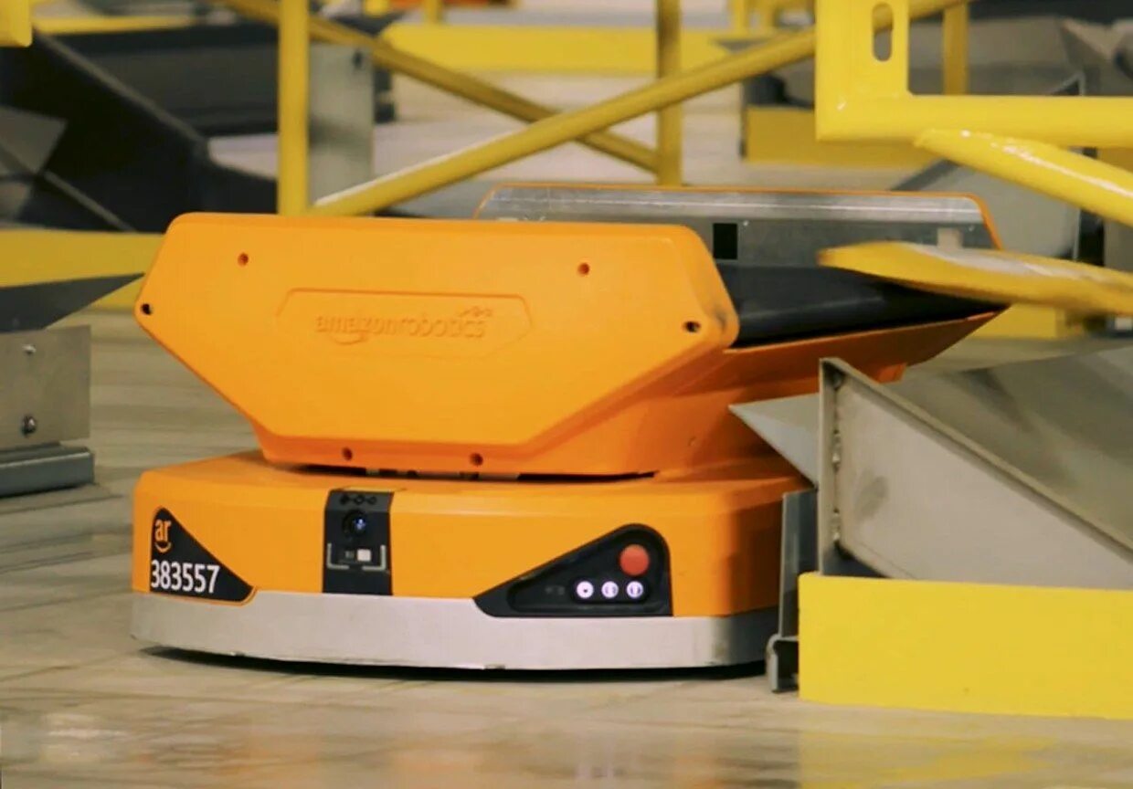 Роботы амазон. Робот кива амазон. amazon robotics pegasus 800 роботов. складские роботы amazon pegasus. роботизированные склады.