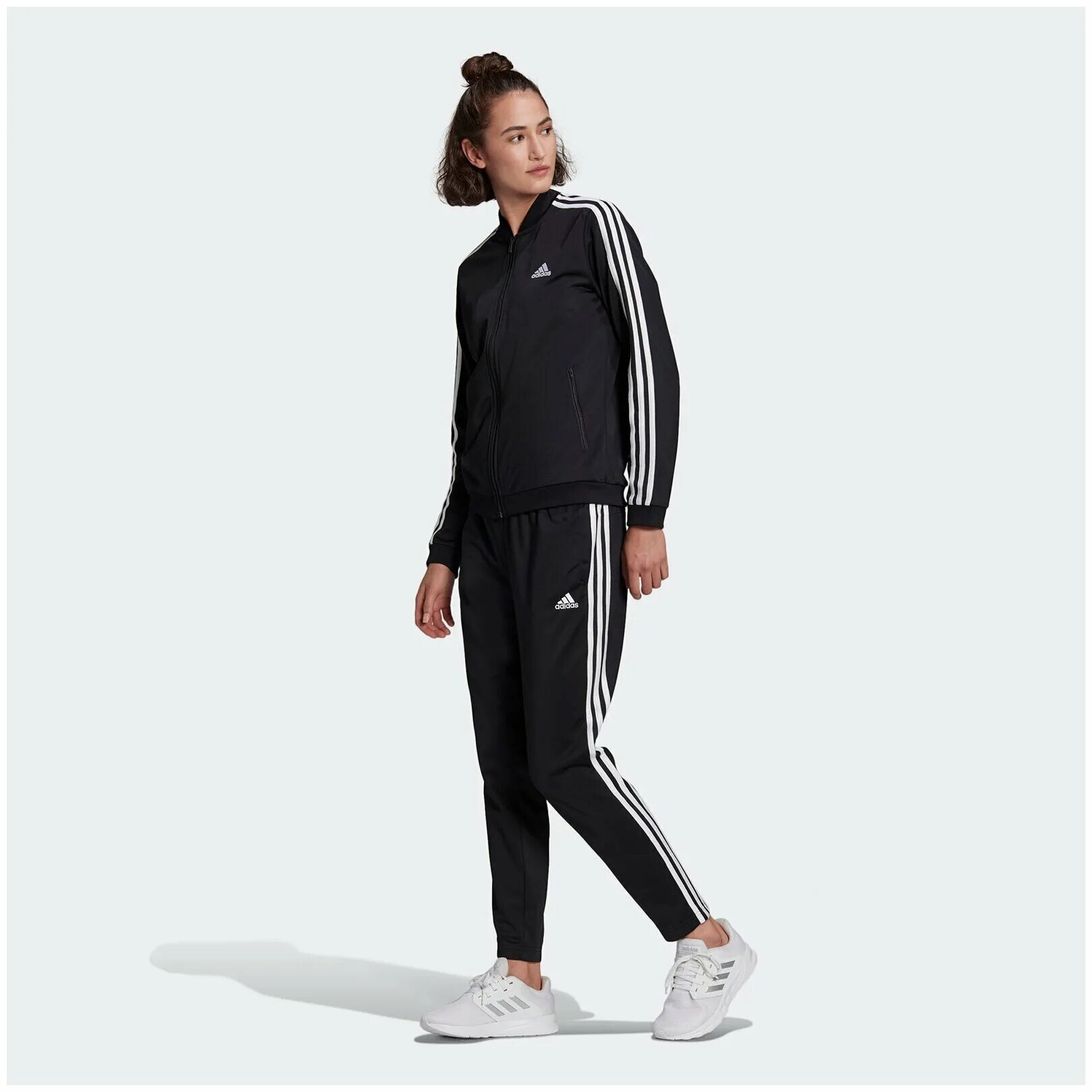 Костюмы адидас оригинал женские. Костюм спортивный adidas Essentials 3-Stripes track Suit gm5534. Tuta adidas Donna. Adidas Essentials 3 Stripes track Suit. Костюм adidas Essentials женский.