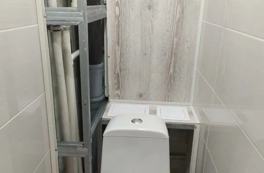 Как в ванной закрыть трубы панелями