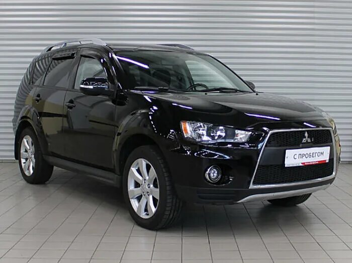 Mitsubishi Outlander 2010. Mitsubishi Outlander XL 2012 черный. Митсубиси Аутлендер XL 2010. Mitsubishi Outlander 2010 черный. Мицубиси аутлендер хл 2010