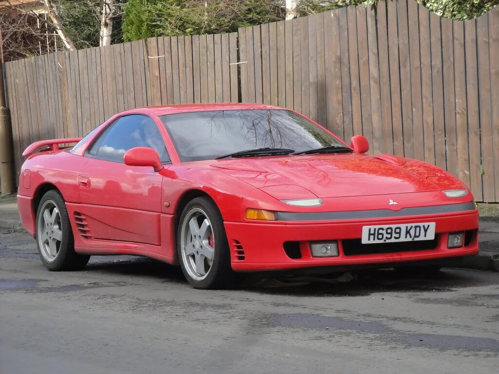 Митсубиси 1990. Mitsubishi GTO 3000gt 1990. Mitsubishi 3000gt 2000. Mitsubishi 3000 gt 1990-2000. Мицубиси 3000 gt 2000.