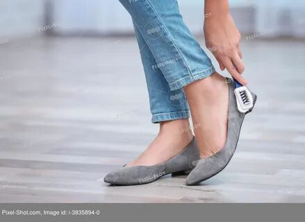 Clean her shoes