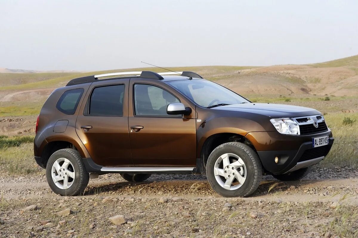 Какой в рено дастер залиты. Renault duster 2010. dacia duster 2010. renault duster 1. рено дастер 2009.