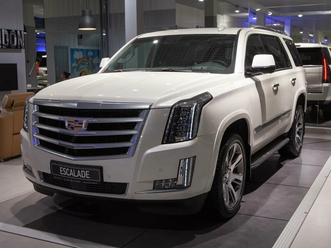 Кадиллак эскалейд 6.2. Кадиллак Эскалейд белый. Кадиллак Эскалейд 4. Cadillac Escalade 6,2. Cadillac Escalade 2018.