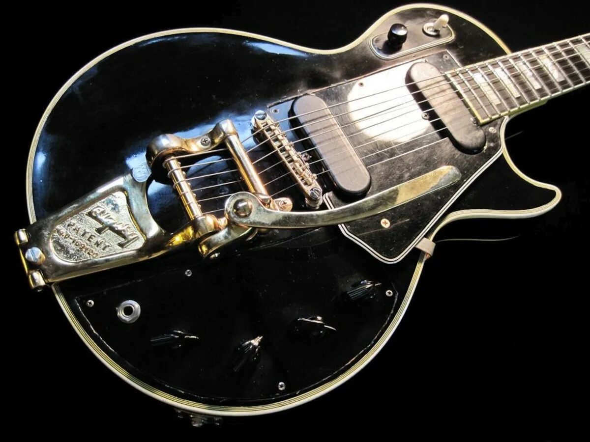 Мир электрогитар. Электрогитара Гибсон лес пол. Гибсон лес пол 1954. Gibson les Paul Custom Black Beauty. Первый Gibson les Paul.