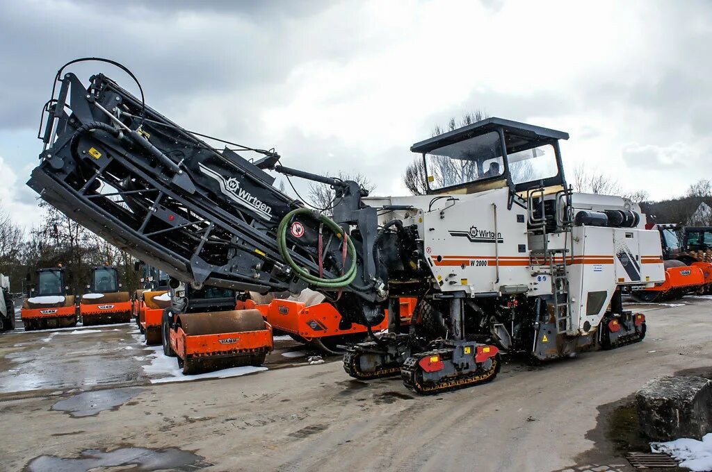 Фреза дорожная wirtgen w2000. Дорожная фреза для снятия асфальта. Дорожная фреза для снятия асфальта. 3300121 виртген. Виртген фреза 200.