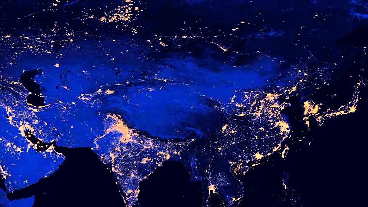 Окр мир ночью. Земля из космоса ночью Россия. Ночь на земле. Азия ночью из космоса. Снимок России из космоса ночью.