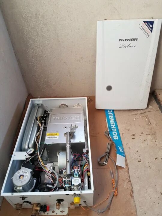 Навьен спустить воздух. Навьен делюкс 40к. navien 30k. navien deluxe one 30k насос. котел navien deluxe внутри.