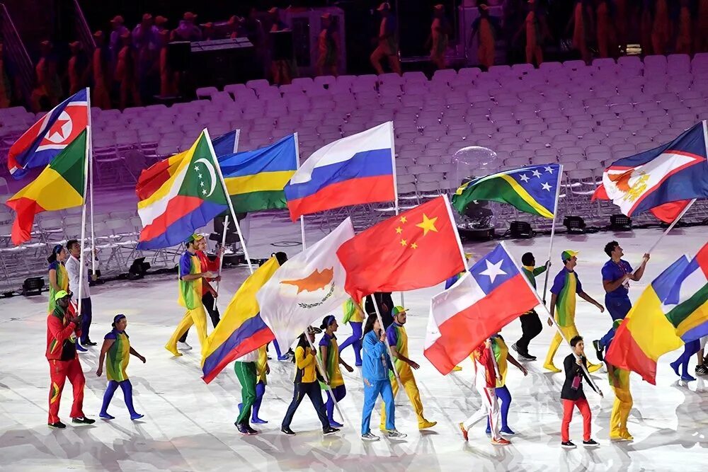 Страны летних олимпиад. Международные спортивные соревнования. Олимпийские игры. Спортсмен с флагом.
