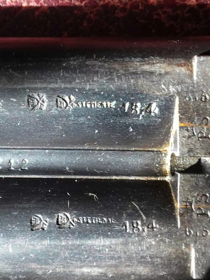 Клейма оружейного завода иж. 1669 ружье бельгийское клеймо elg. Клеймо ружья иж 27е. Клейма охотничьих ружей бельгия. Клейма на охотничьих ружьях.