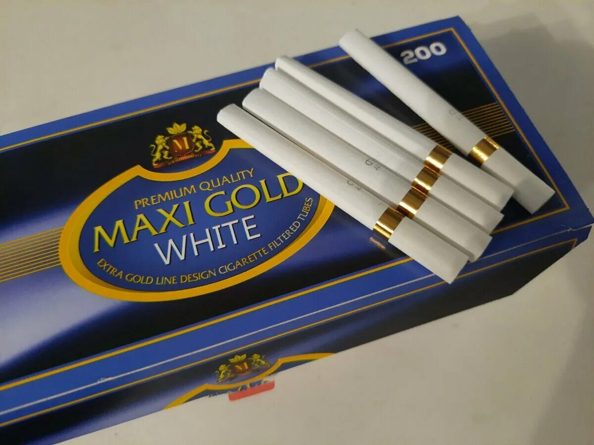 10 пачка лет. Гильзы макси Голд. Гильзы для сигарет Maxi Gold. Гильзы для сигарет Maxi Gold черная коробка. Гильзы папиросные.