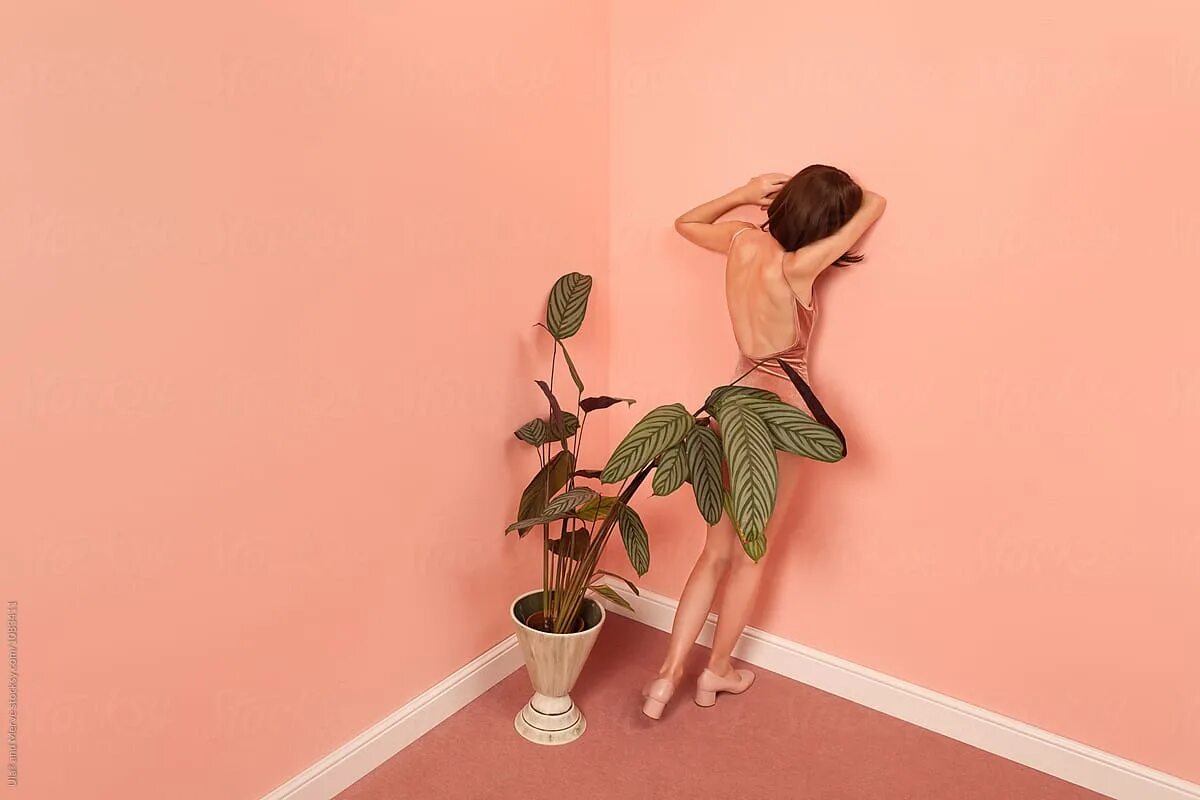 Lean against. Leaning against. A woman leaning against a Wall. Women staringnear Pink Wall photo PNG Unsplash.