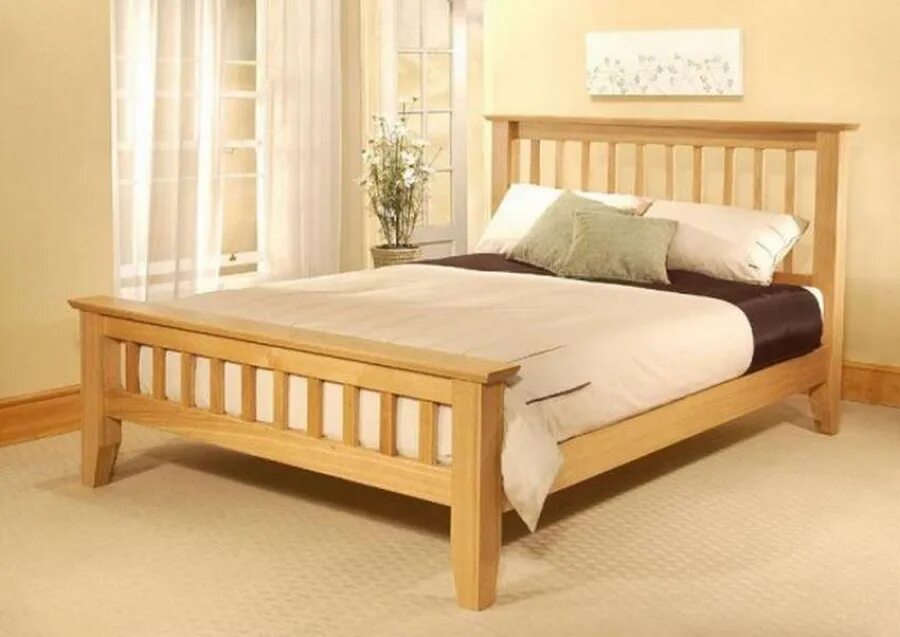 Двуспальная кровать фото дерево. Кровать деревянная. Кровать двуспальная деревянная. Простая деревянная кровать. Кровать из дерева двуспальная.