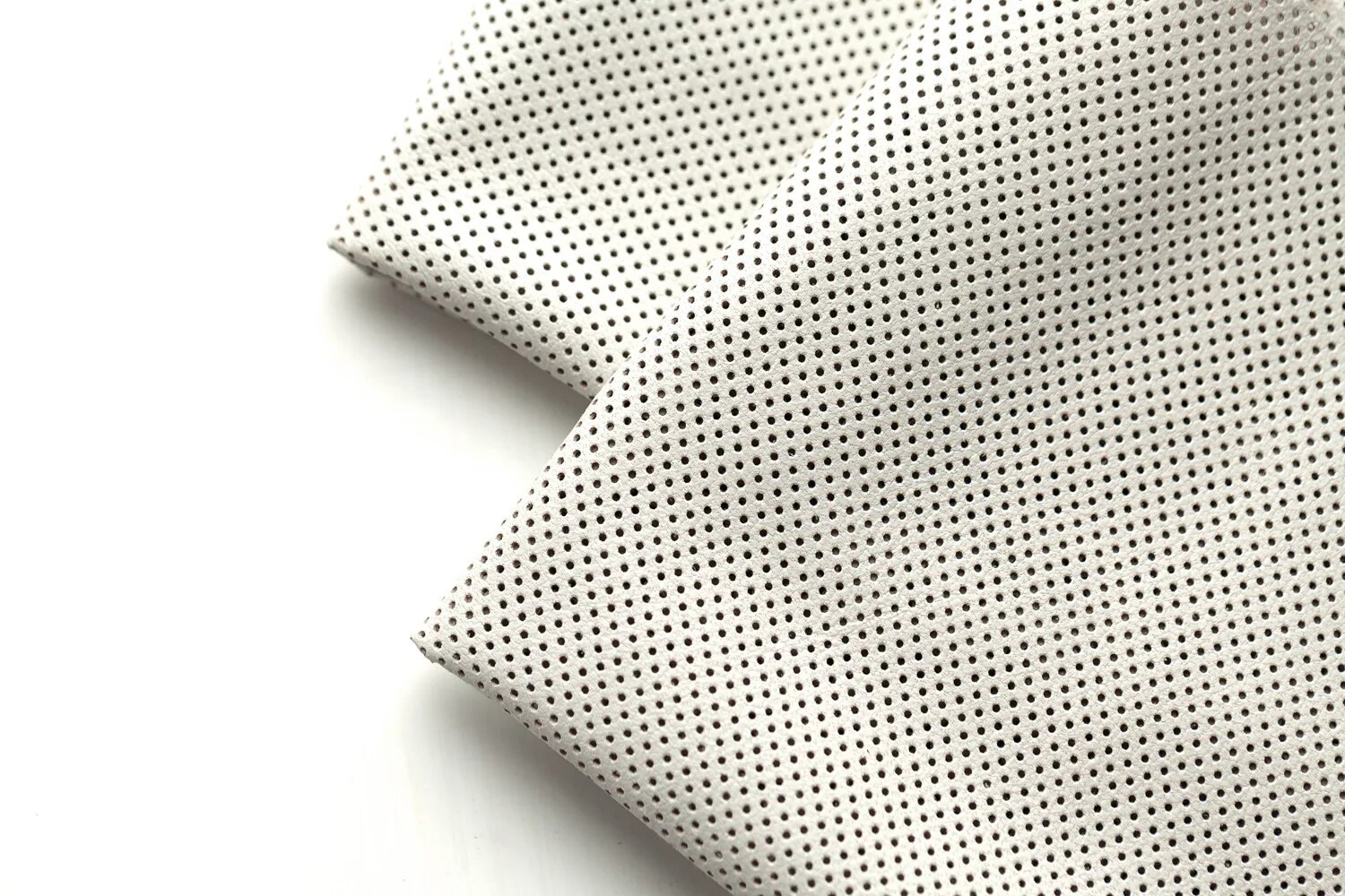 натуральная кожа с перфорацией. перфорированная натуральная кожа. натуральная кожа с перфорацией. кожа перфорированная автомобильная. перфорированная натуральная кожа.