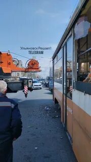 Возле площадки в поле в трамвае