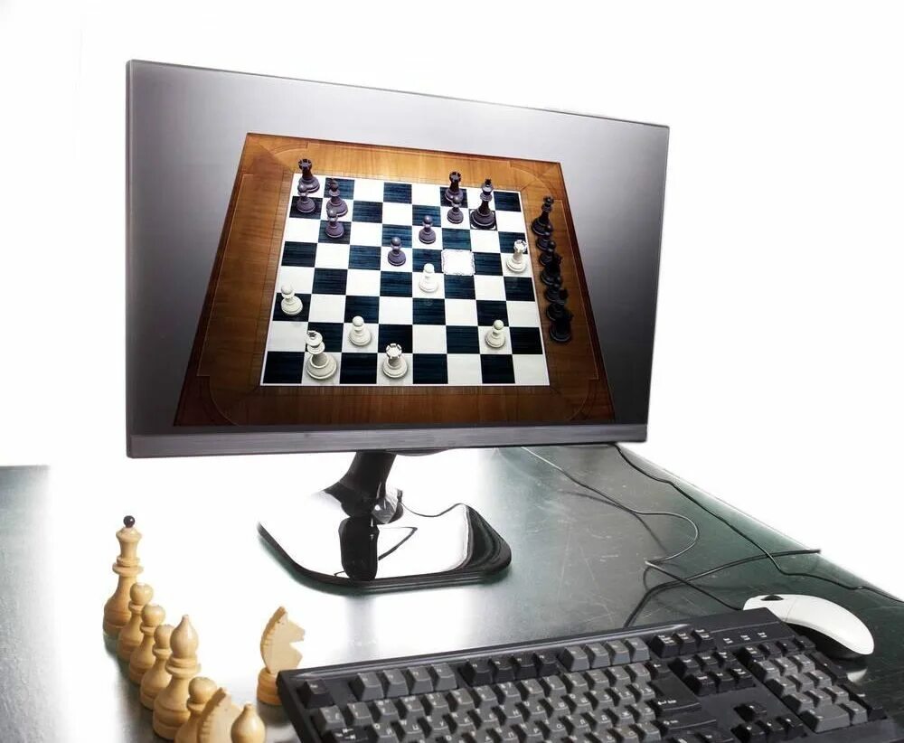 Шахматы на экране монитора. Шахматы. Компьютерные шахматы. Шахматы по компьютерным играм. Шахматный компьютер.