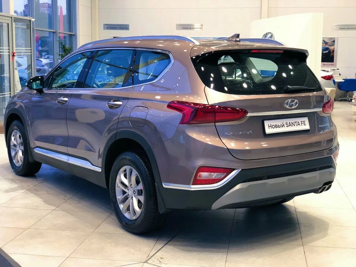 Комплектации нового санта фе. Hyundai Santa Fe 2021 Brown. Хендай Санта Фе 2022. Hyundai Santa Fe 2022 комплектации. Хёндай Санта Фе 2021 комплектации.