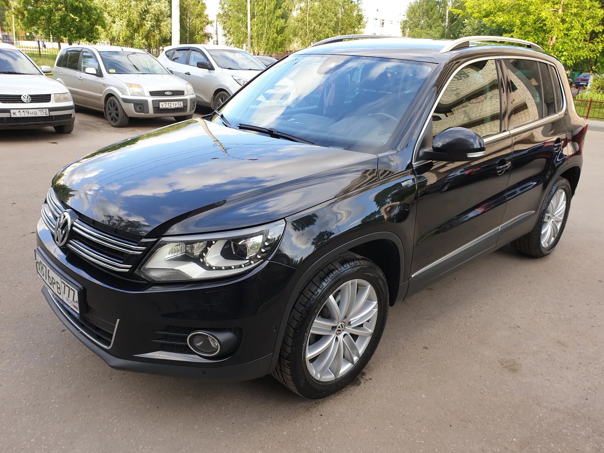 Тигуан 2012 года 2 литра. Volkswagen tiguan черный 2013. tiguan 2012 2.0 черный. фольксваген тигуан 2013 черный. tiguan 2 рестайлинг черный.