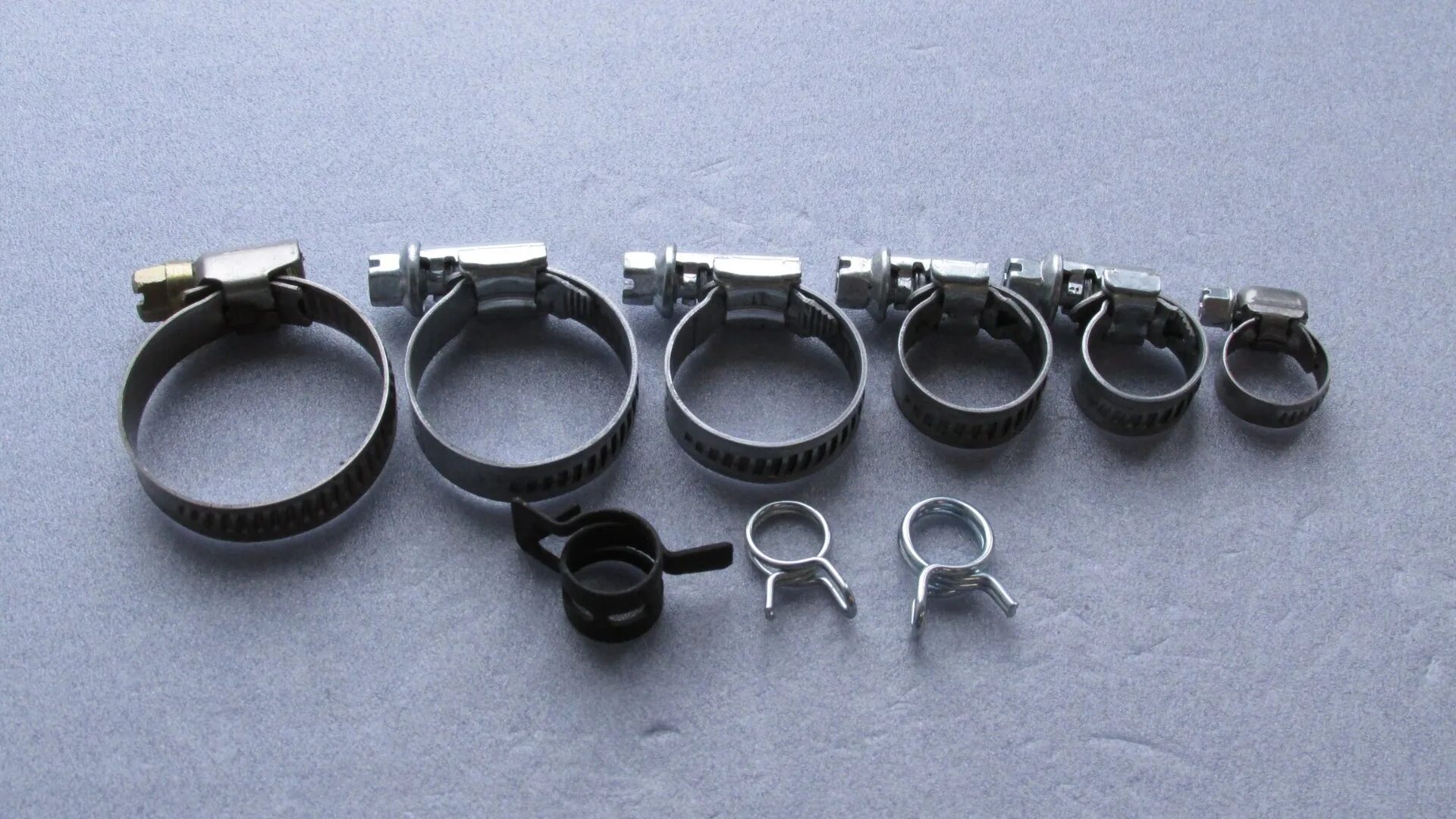 Fbs 4012 пружинный хомут. Хомуты самозажимные norma. Brc хомут пружинный 12мм. Пружинные хомуты для шлангов системы охлаждения. Пружинные хомуты для шлангов системы охлаждения.