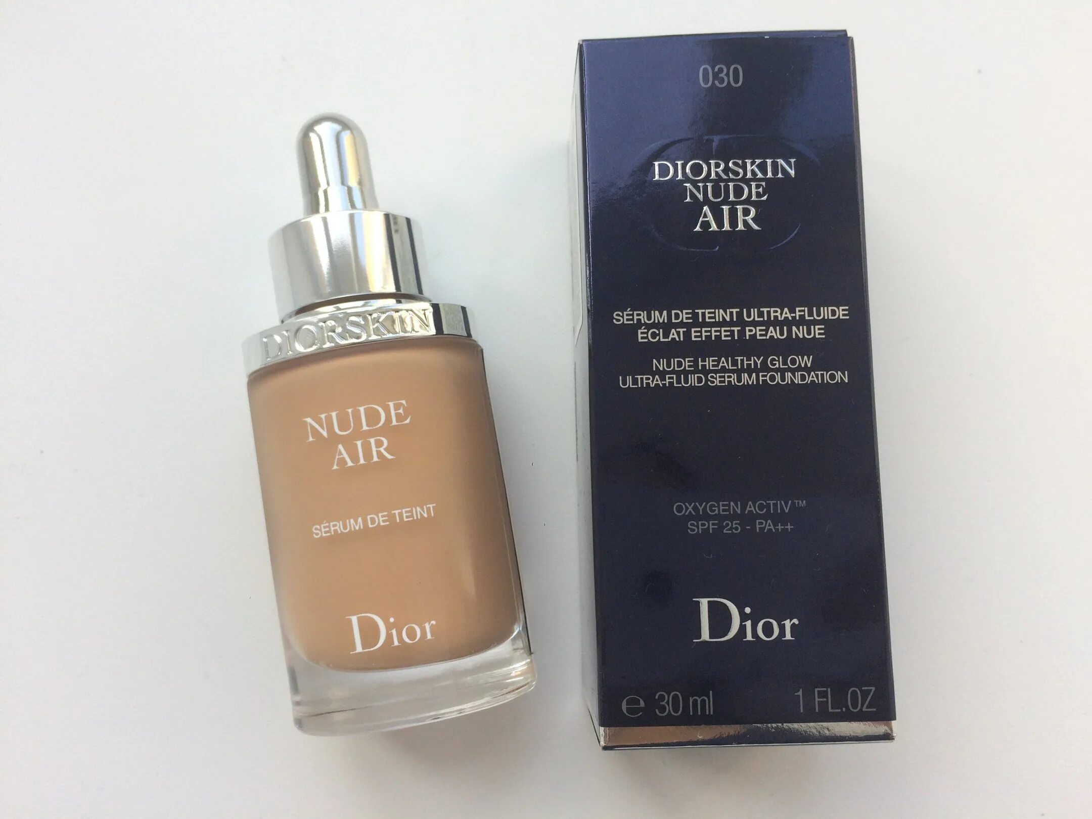 Диор нюд. Тональная сыворотка Diorskin nude Air. Dior nude Air тональная сыворотка 033. Тональная сыворотка диор 030. Диор нюд Эйр оттенки.