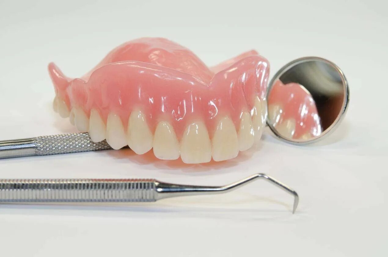 безметалловый бюгельный протез. нейлоновый микропротез 1-3 зуба. съемный протез (6-14 зубов) термо джет. съемный протез (6-14 зубов) термо джет. нейлоновый бюгельный протез квадротти 1 челюсть.