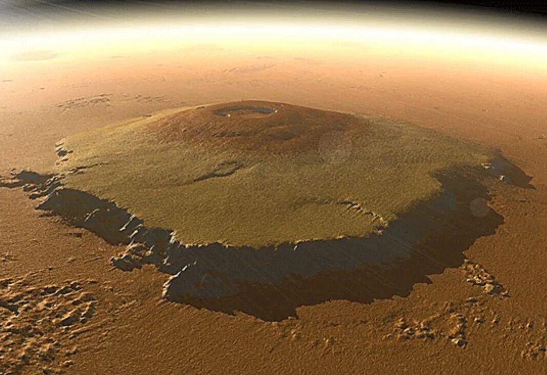 Самая высокая гора в солнечной системе находится. Гора Олимп на Марсе. Вулкан Олимп на Марсе. Марс Планета гора Олимп. Олимпус Монс на Марсе.
