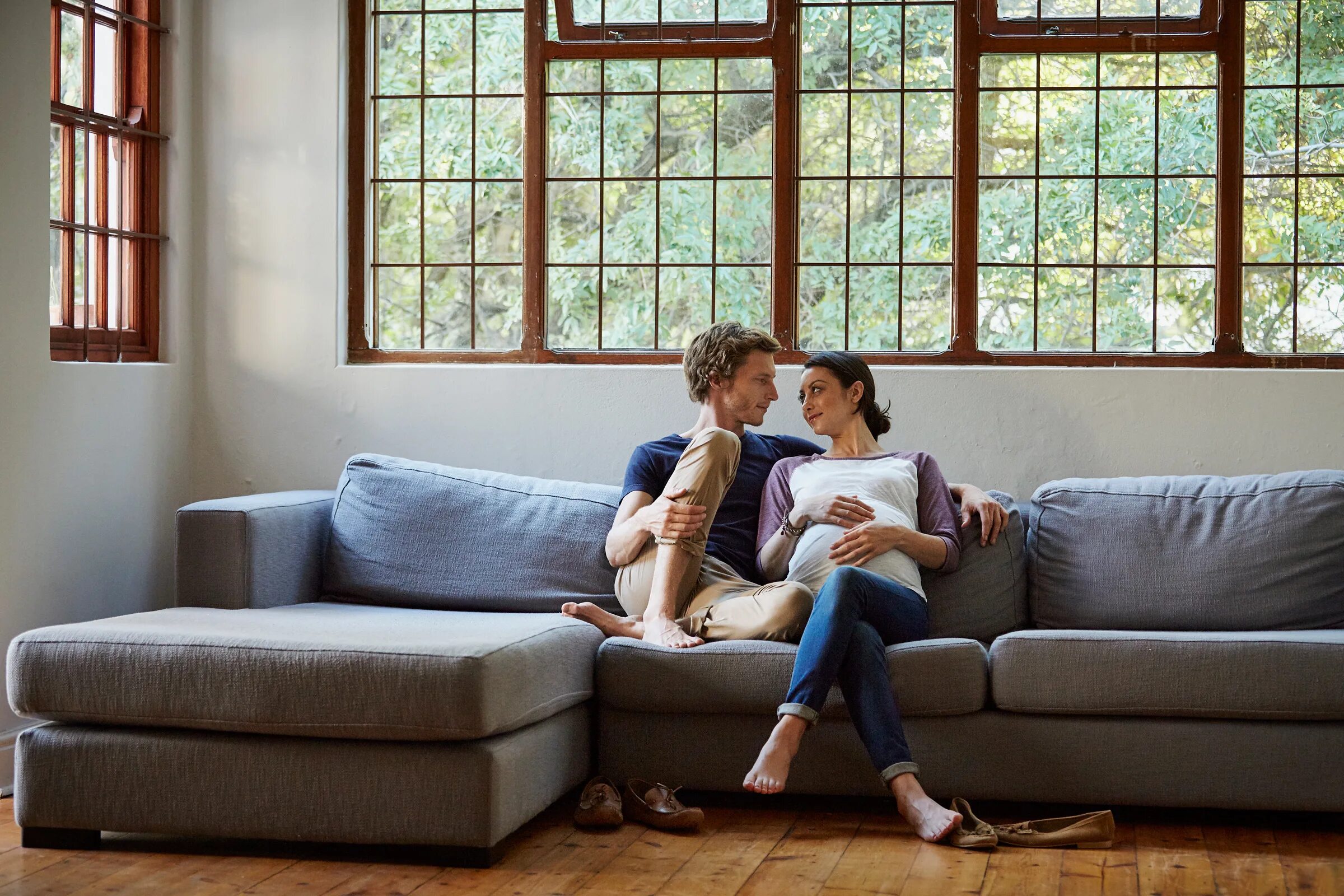 There are two sofas in the room. Sitting on the Living Room Sofa. Sit on the Sofa или in the Sofa. Любовь комфорт интерьер. Couple on Sofa.